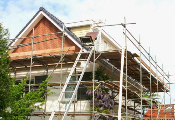 Outside,renovation,of,modern,residential,house,,scaffolding,tower
